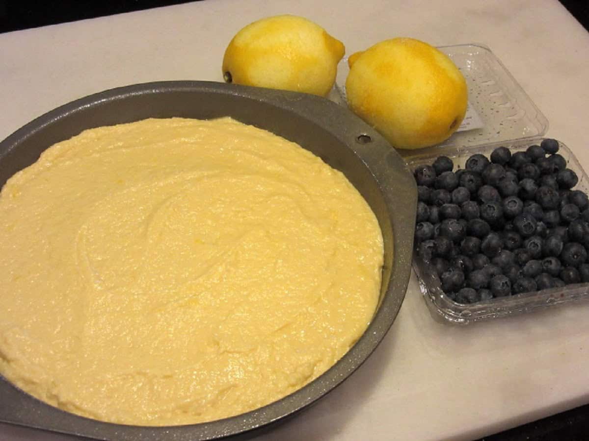 An unbaked lemon ricotta cake before blueberries have been added.