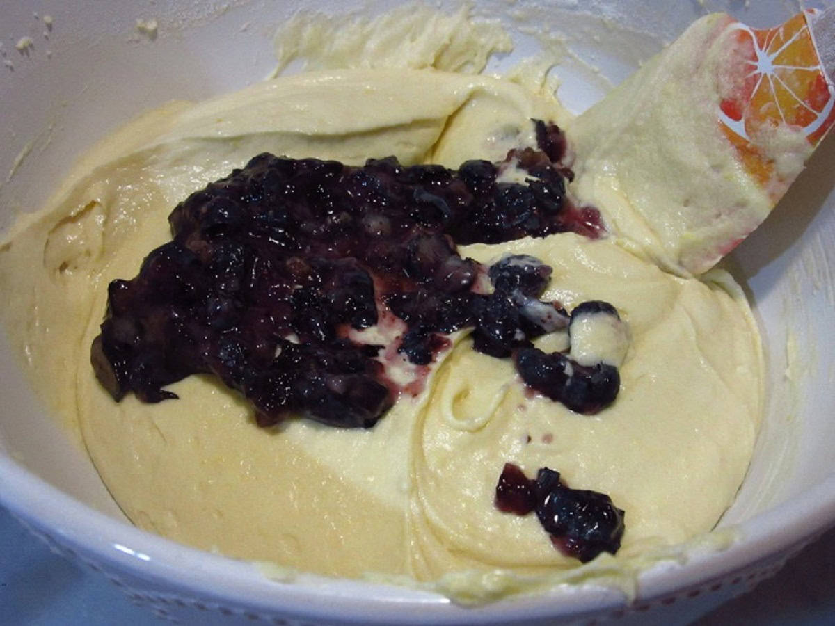 Crushed blueberries in a batter.