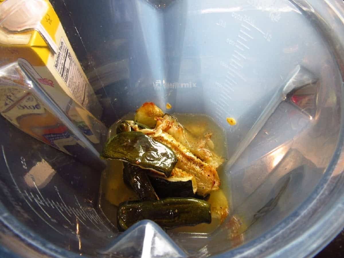 Chicken stock and roasted zucchini in a blender.