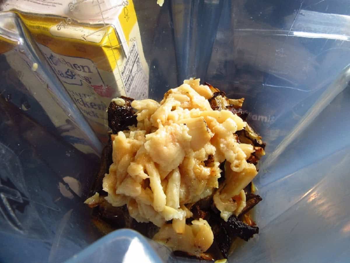 Creamy roasted garlic in a blender.