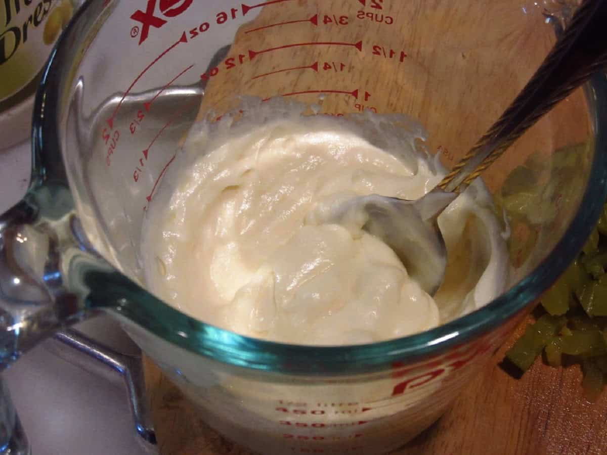 Mayonnaise in a measuring cup for making special sauce.
