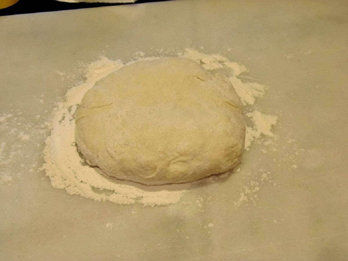 A blob of bread dough on the counter.