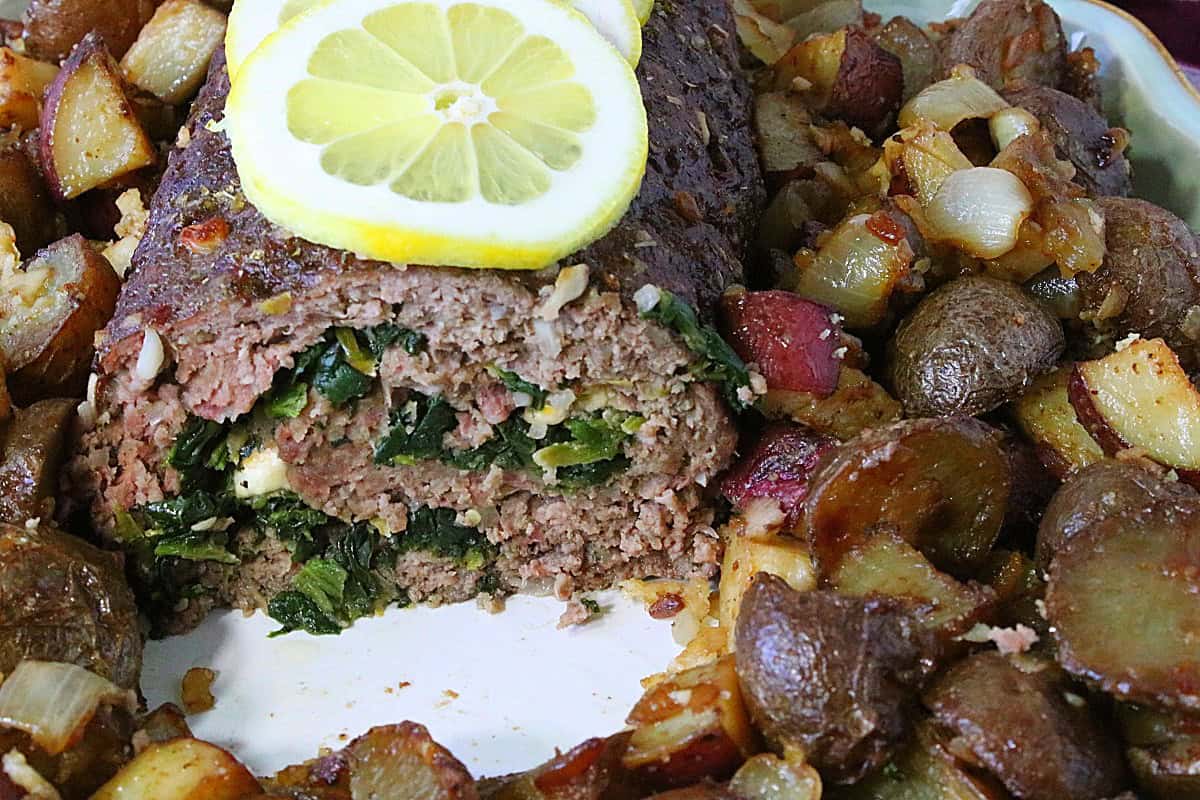 The spiral insides of a Rolled Greek Meatloaf stuffed with spinach and feta cheese.