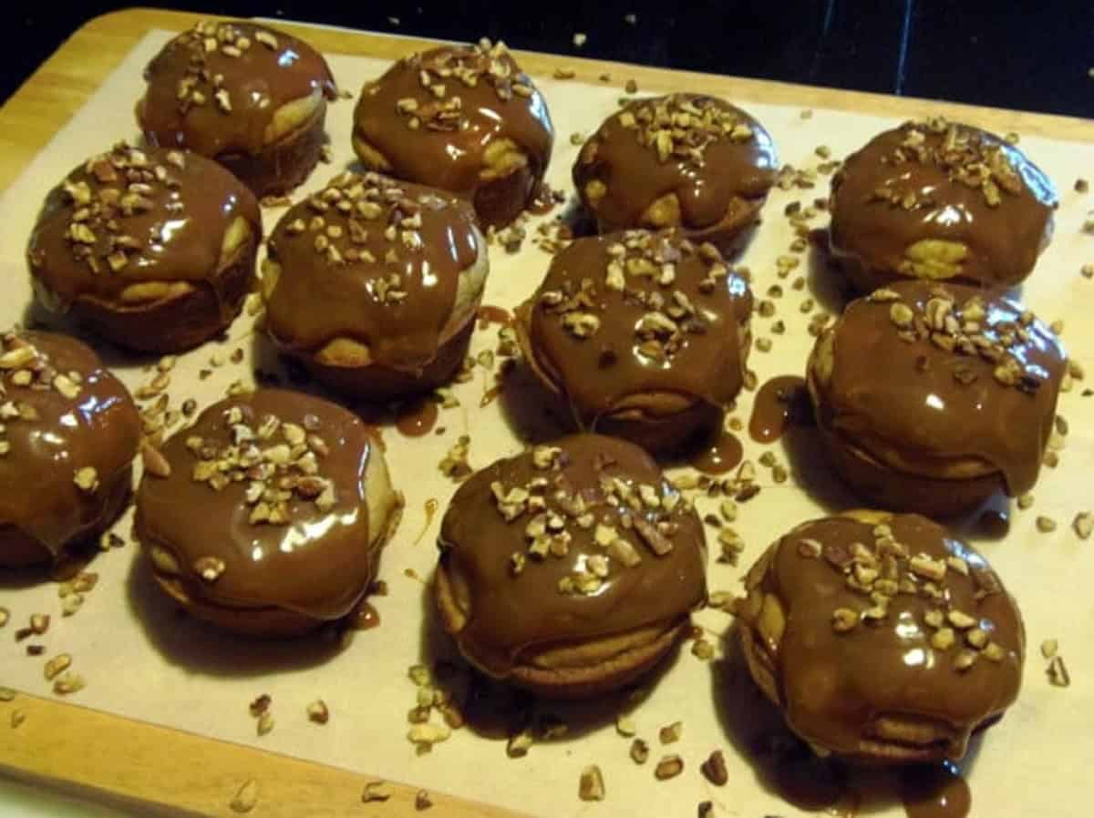Toasted nut on top of Caramel Apple Cupcakes.