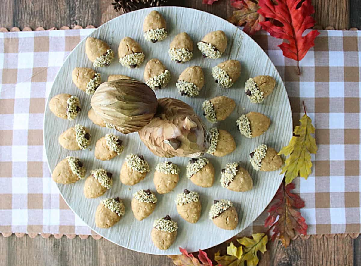 An overhead photo display of a round platter filled with Oatmeal Acorn Cookies.