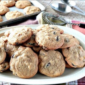 A platter filled with 1930s vintage rocks cookies with baking utensils in the background.