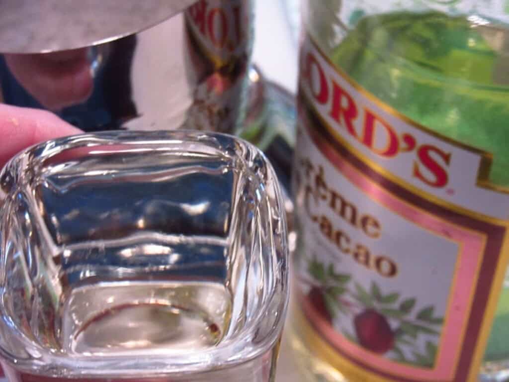 Creme de cacao in a shot glass.