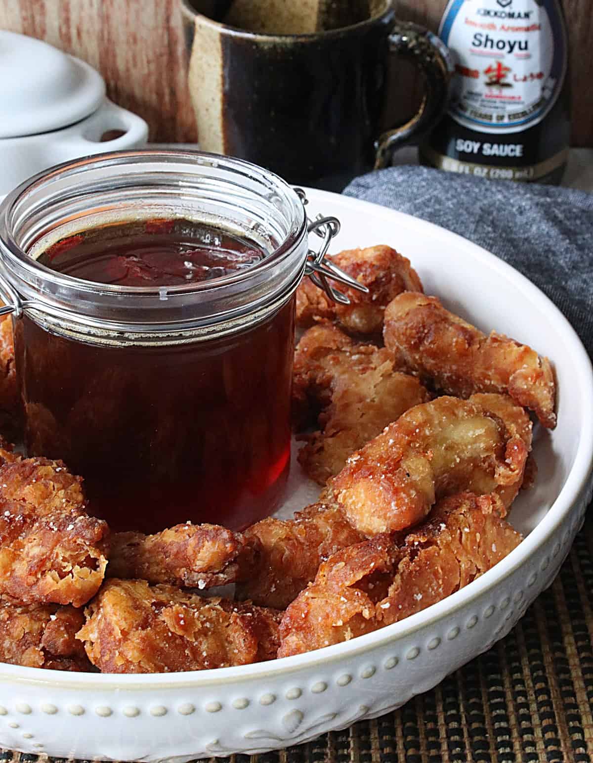A white bowl filled with brown and crispy Japanese Fried Chicken Nuggets.