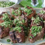 Cooked lamb chops topped with parsley and garlic persillade.