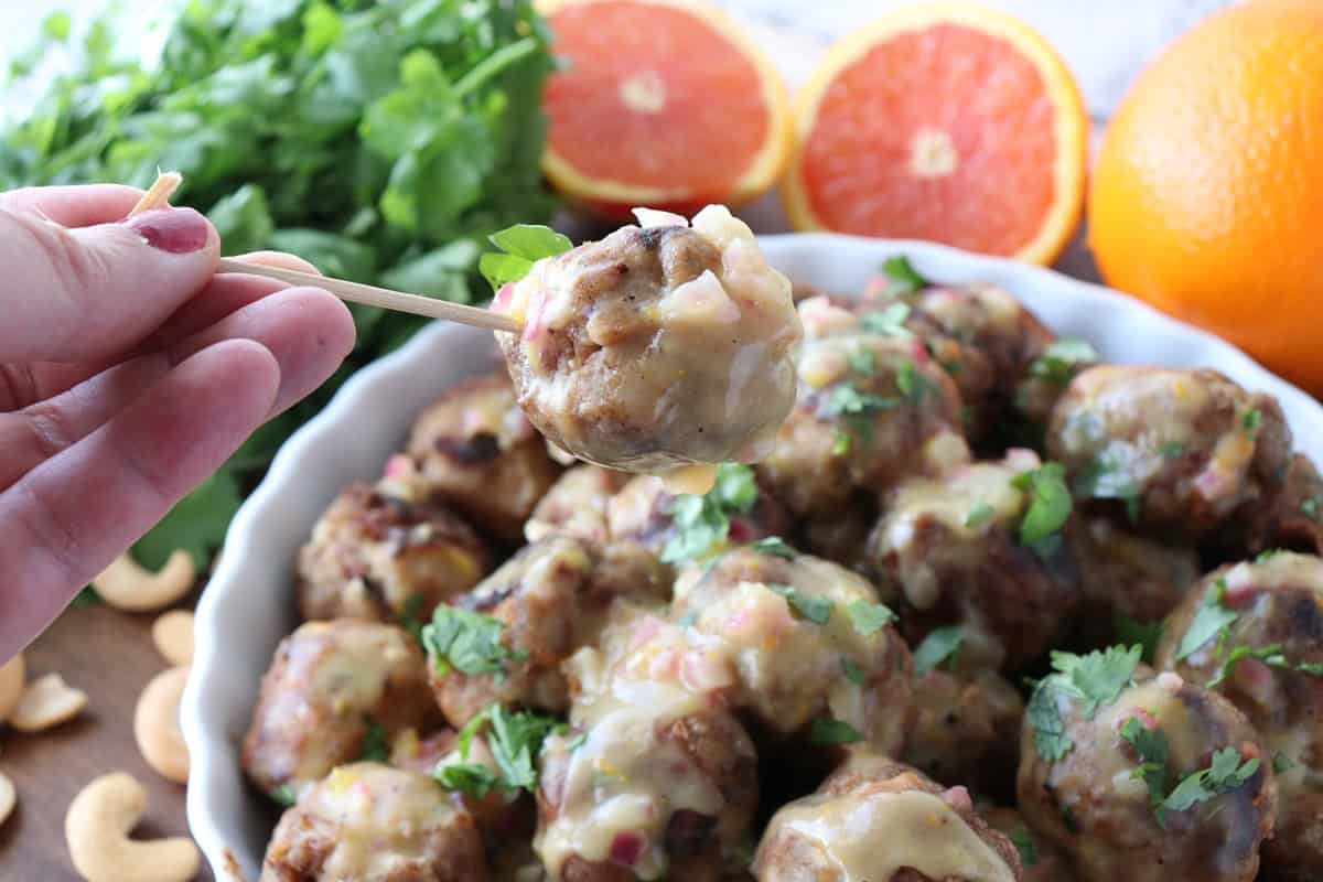 A turkey meatball on a wooden toothpick.