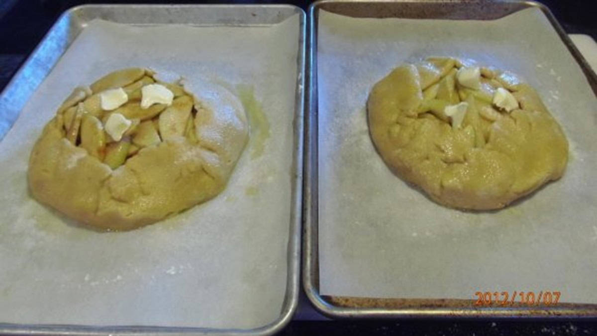 Two rustic apple crostatas before baking.