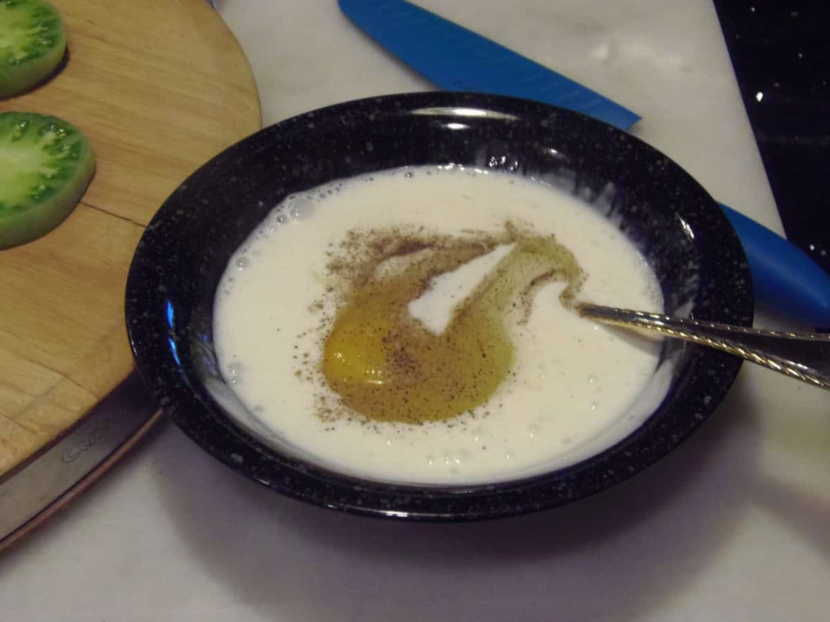 The wet ingredients in a black bowl for making