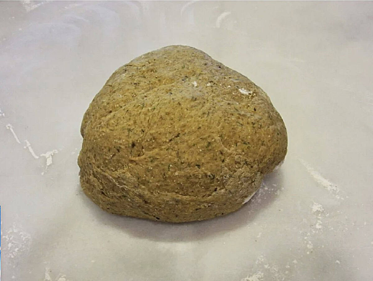 An unproved ball of homemade rye dough.