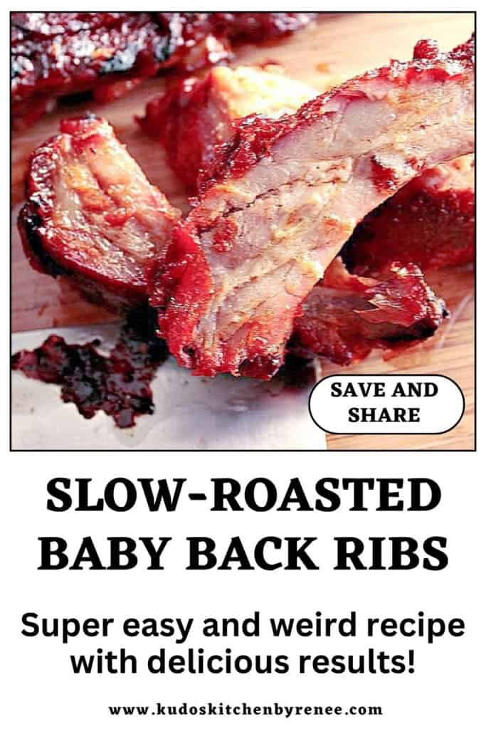 A tender looking stack of slow roasted baby back ribs with BBQ sauce on a wooden board.