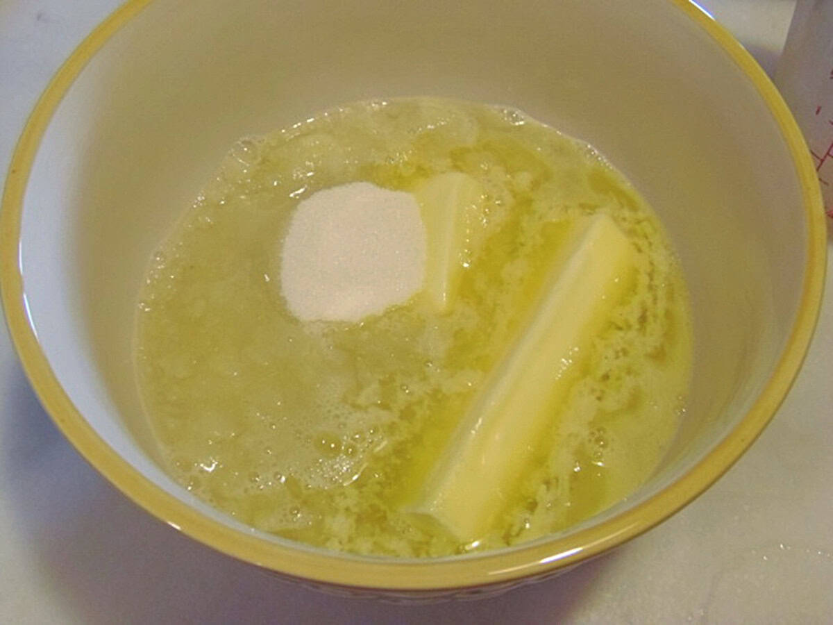 Melted butter, sugar and water in a bowl.