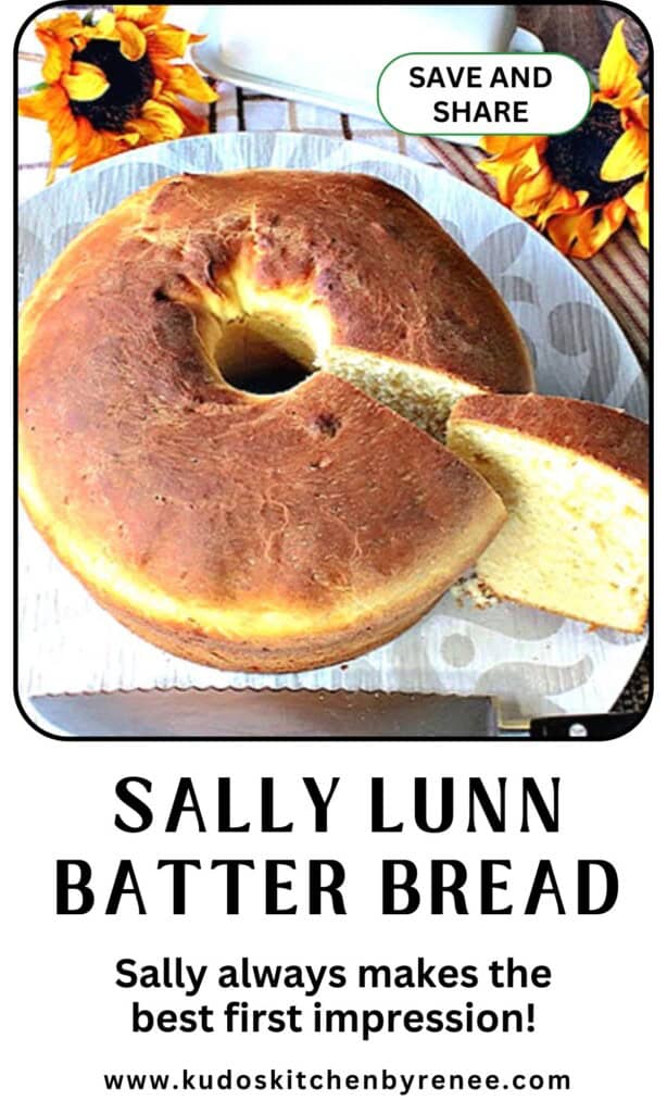 A beautifully shaped round loaf of Sally Lunn Batter Bread with a slice taken out.