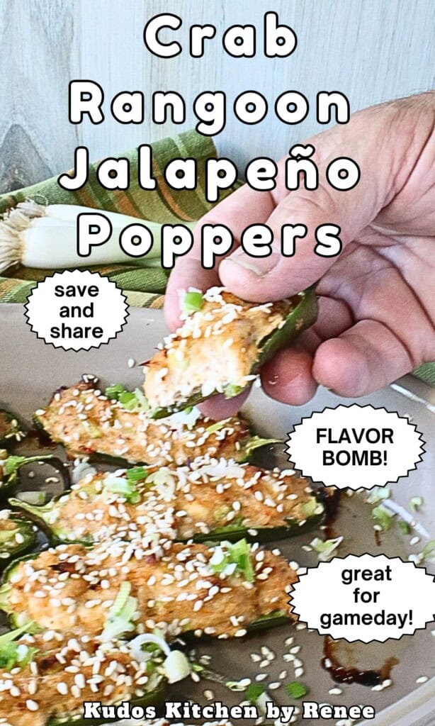 A hand holding a crab rangoon jalapeno popper over a baking dish filled the the same appetizers.