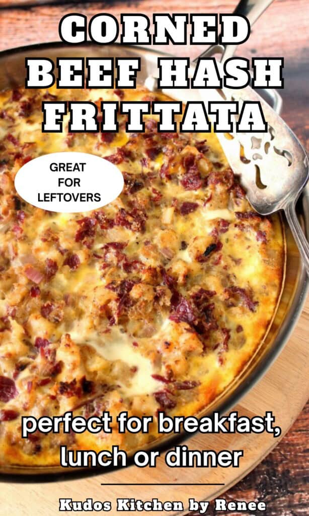 A silver skillet with a cooked corned beef hash frittata inside along with a silver spatula resting on top.