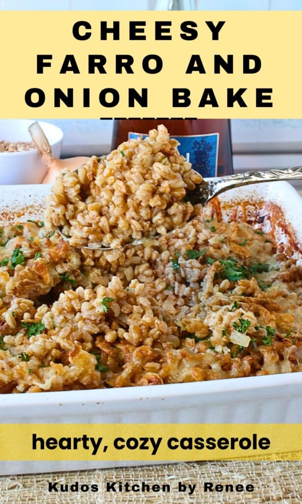 A white casserole dish filled with a golden, nutty farro casserole.