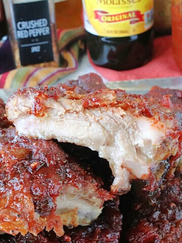 The juicy insides of a cooked Salsa BBQ Sauce Baby Back Rib.