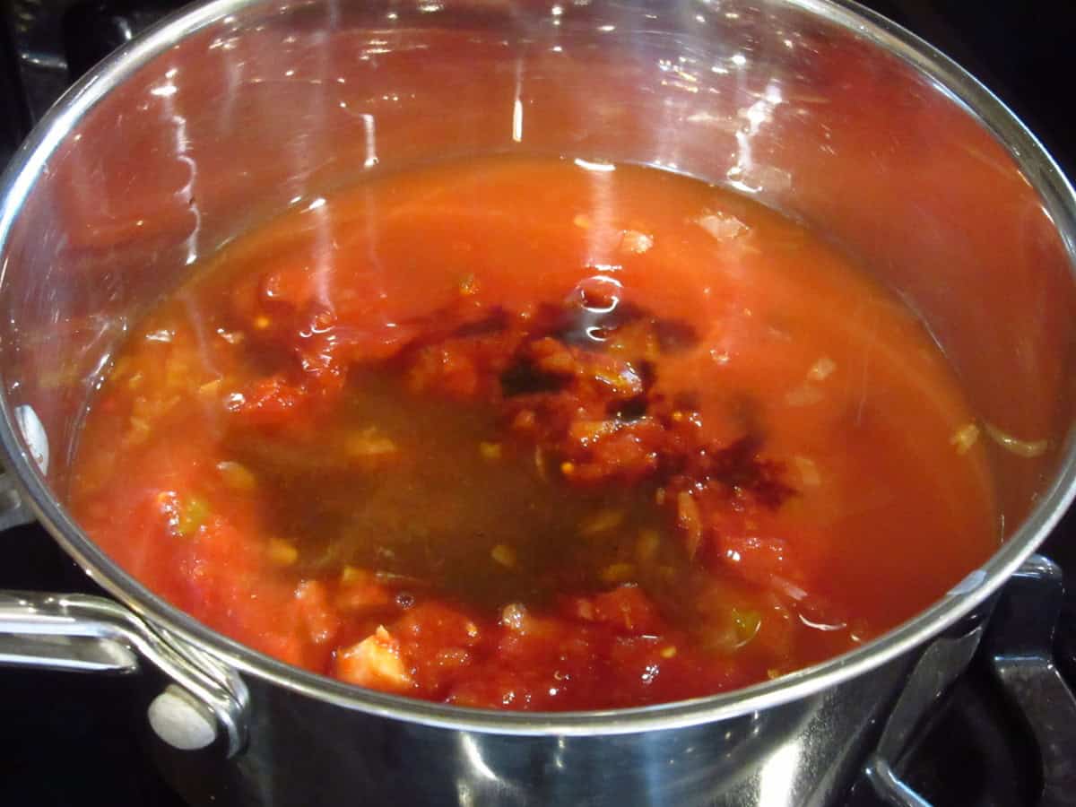 Worcestershire sauce after being added to a saucepan making salsa BBQ sauce.