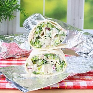 Chicken, lettuce and dressing all inside a flour tortilla wrap.