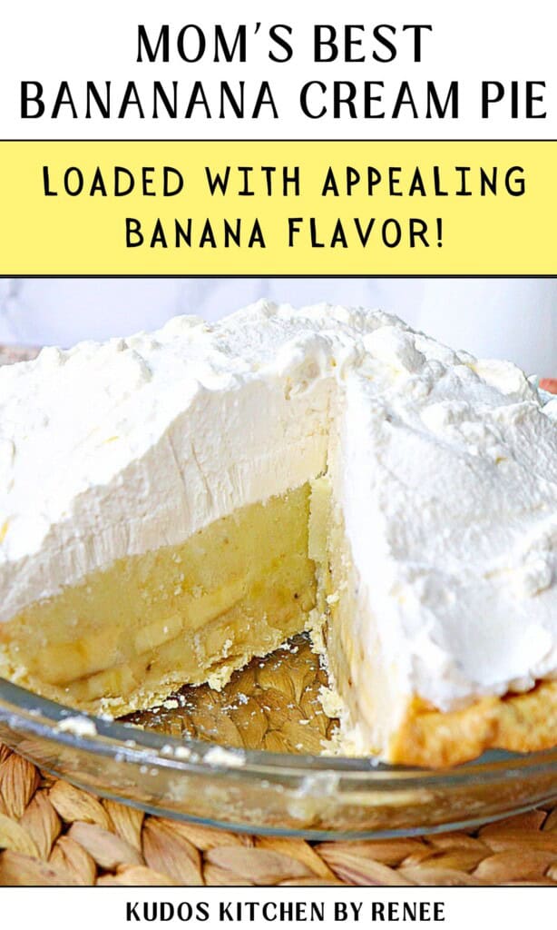 A banana cream pie in a glass pie dish with a big slice taken out.