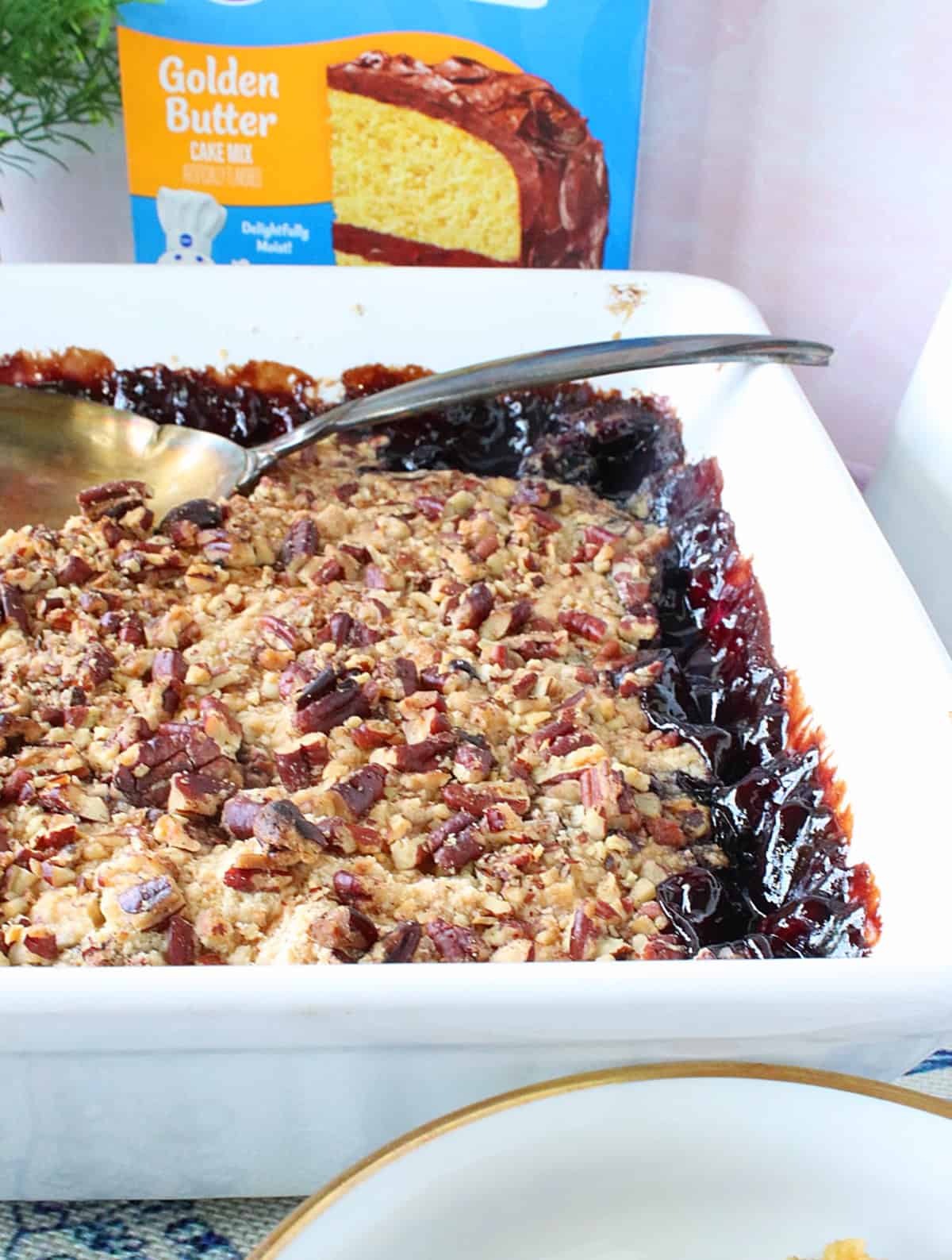 The bubbly blueberry edges of a cake-mix blueberry crisp after baking and before serving.