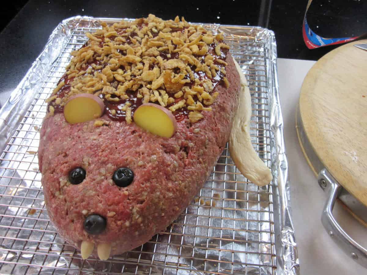 A full frontal view of a rat loaf meatloaf before he goes into an oven to bake.