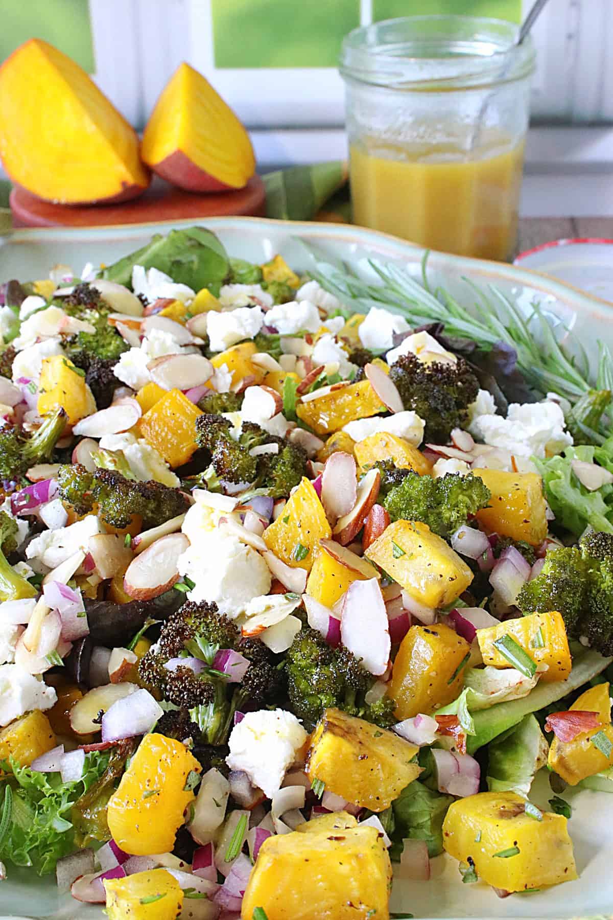 Roasted Golden Beet and Broccoli Salad Golden beets and roasted broccoli salad with red onion, goats cheese, and almond slices.
